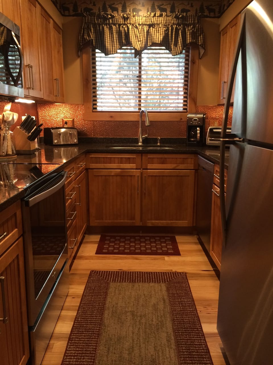 Beautiful well stocked kitchen.