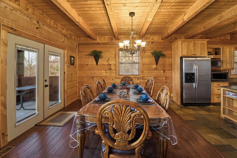 Dining with entry to screened area and to Main level decks.