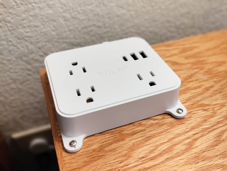 Plug-in chargers at each night stand.