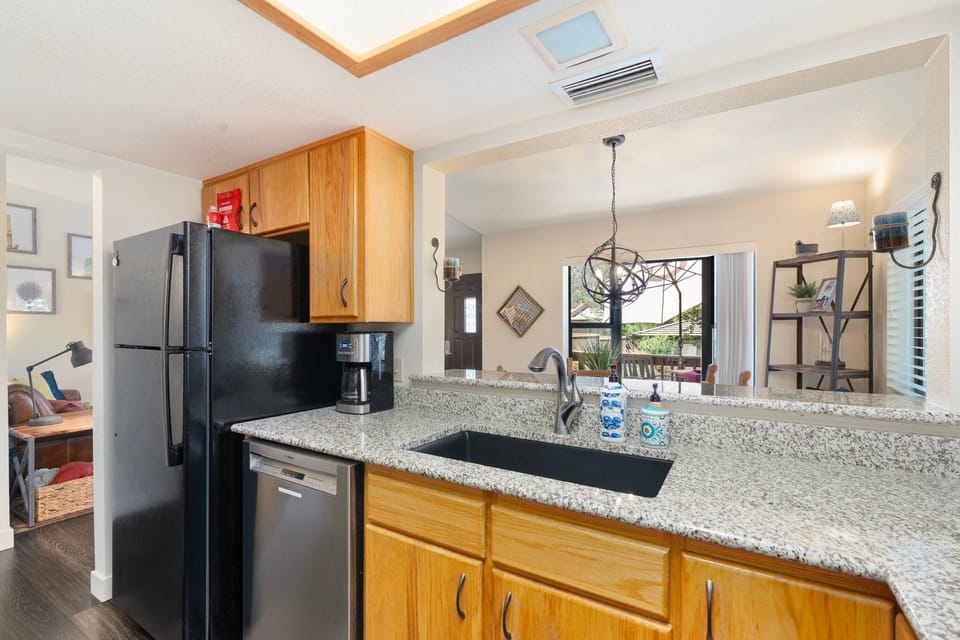 Newly renovated well-stocked kitchen with new upscale appliances