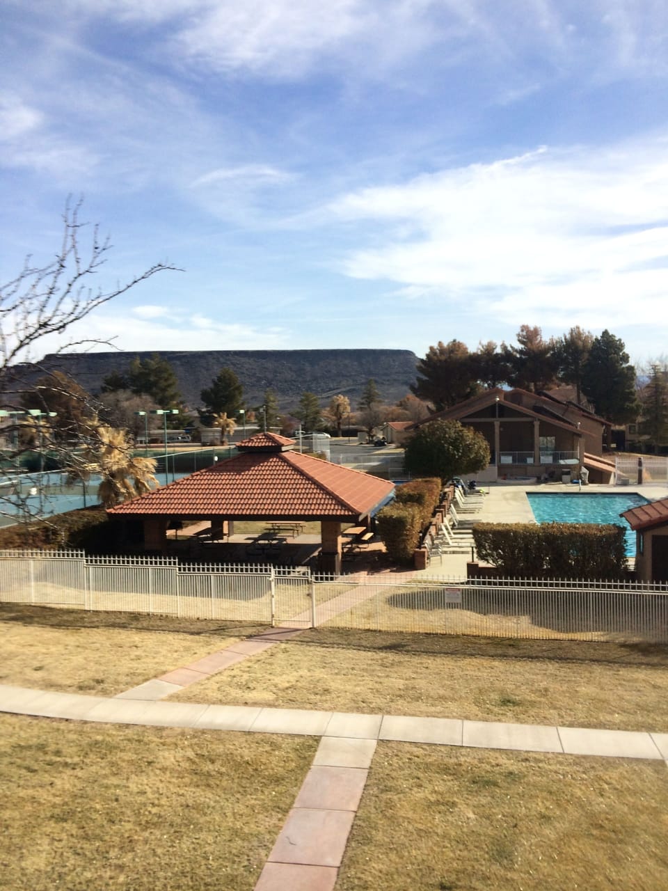Gazebo in the center, pool to the right, tennis to the left!