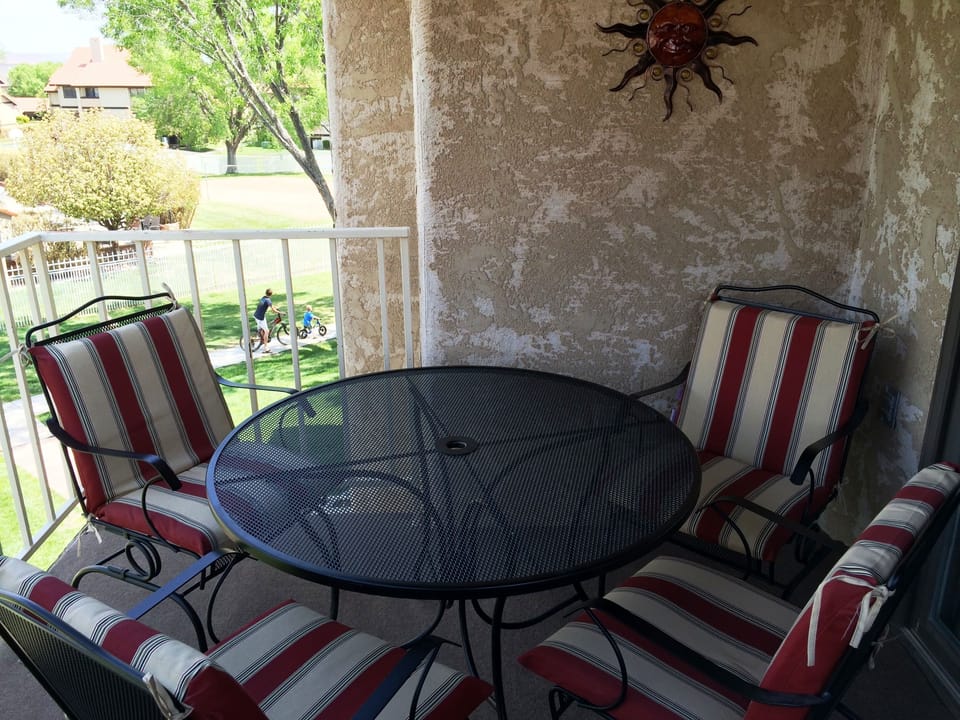 Outdoor table and chairs for outdoor meals and just hanging.  It's covered too.