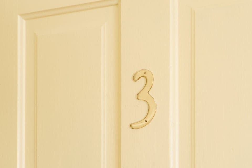 Apartment number 3 at he top of the stairs.