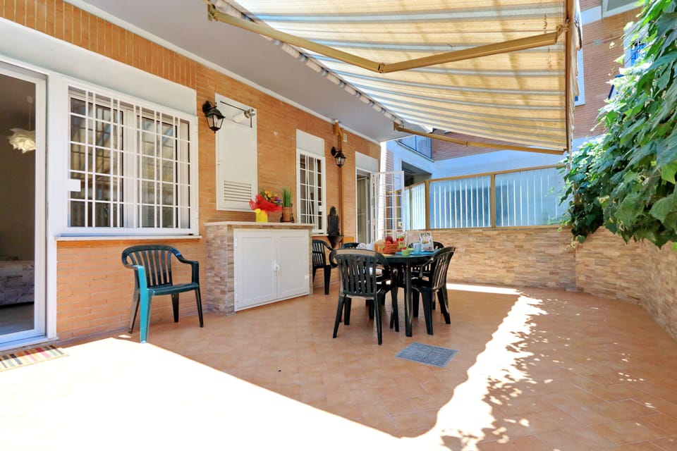 Rear terrace accessed from the kitchen and bedroom 1