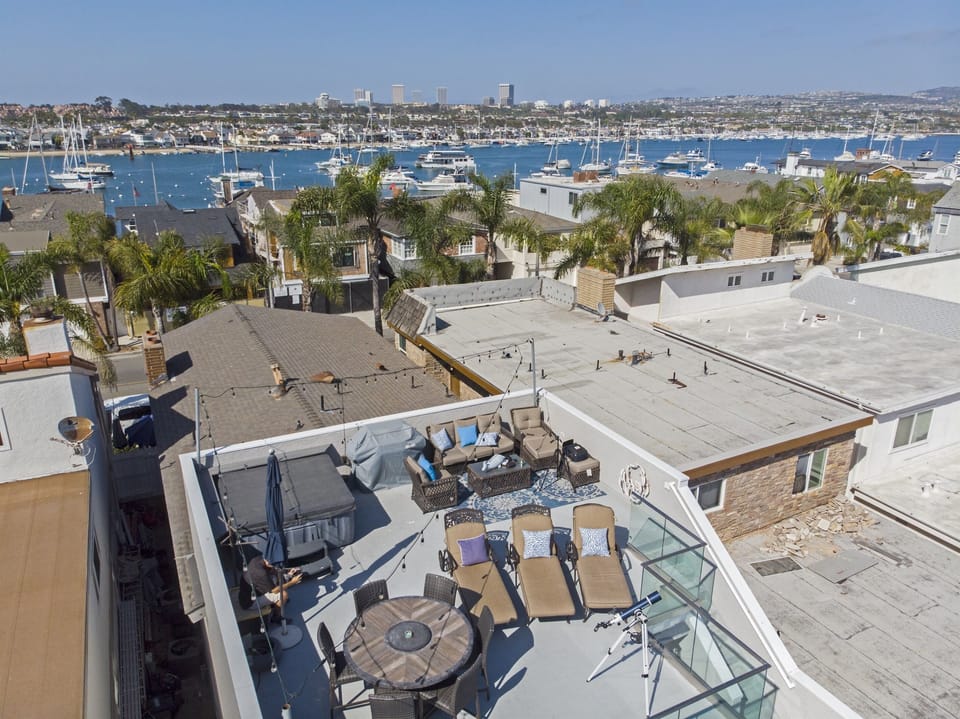 Aerial view of rooftop deck and distance to bay