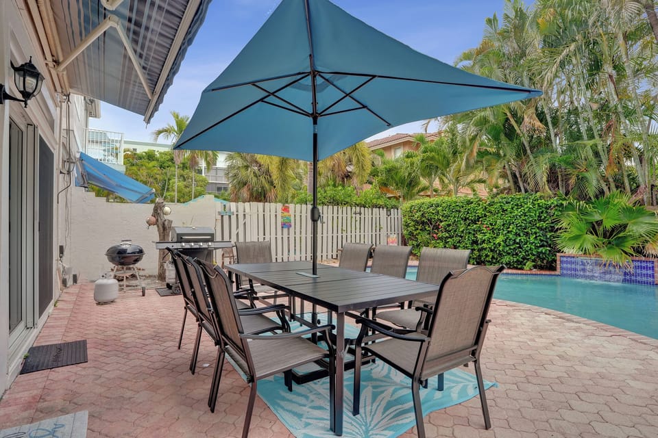 Outdoor dining with charcoal and gas grills