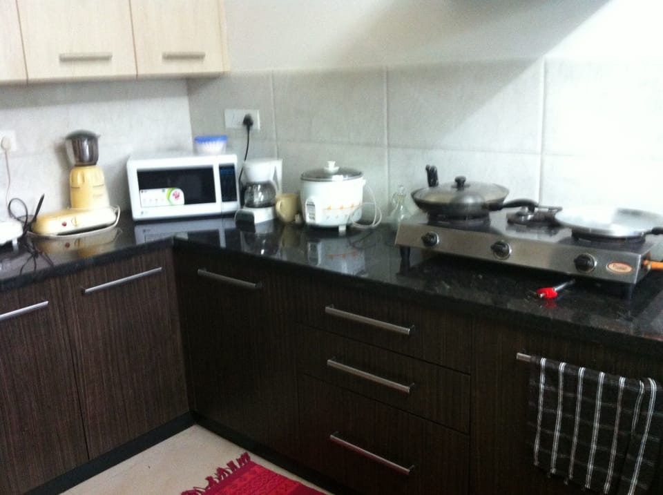 Fully equipped kitchen stocks basics. Rest all's available in near by shops