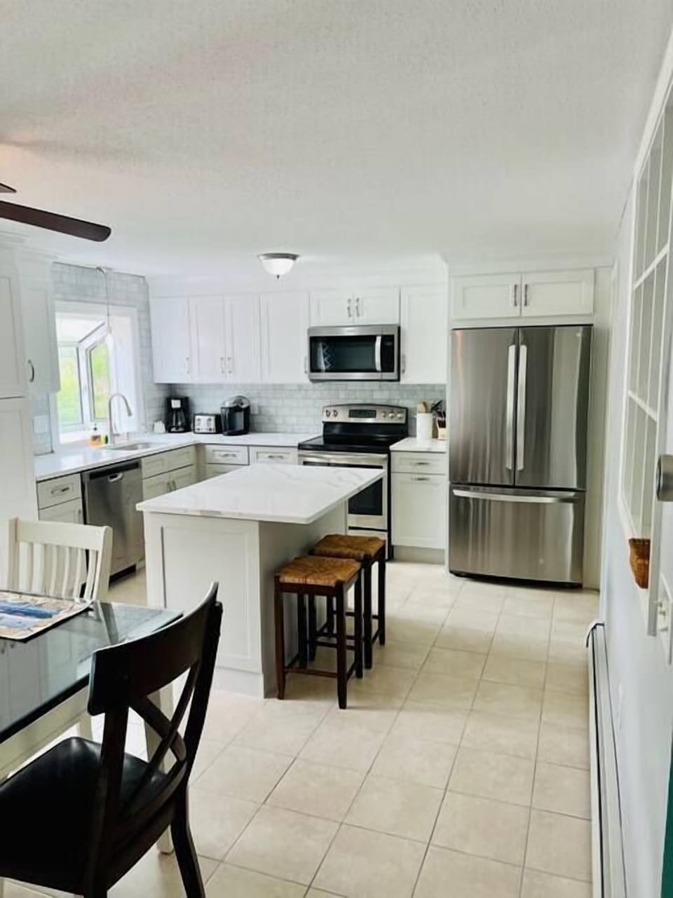 BRAND NEW  Kitchen with Quartz Counter tops. All NEW Stahjiinless Steel appliances. Great for family meals and get togethers over the holidays.