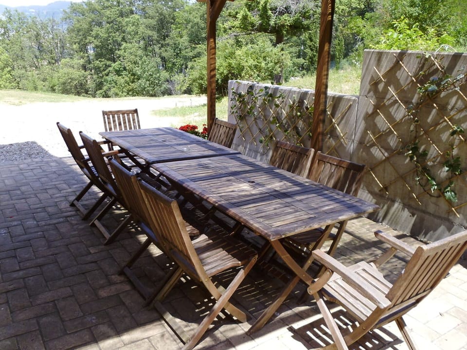 Dining terrace next to the kitchen perfect for all times of day.
