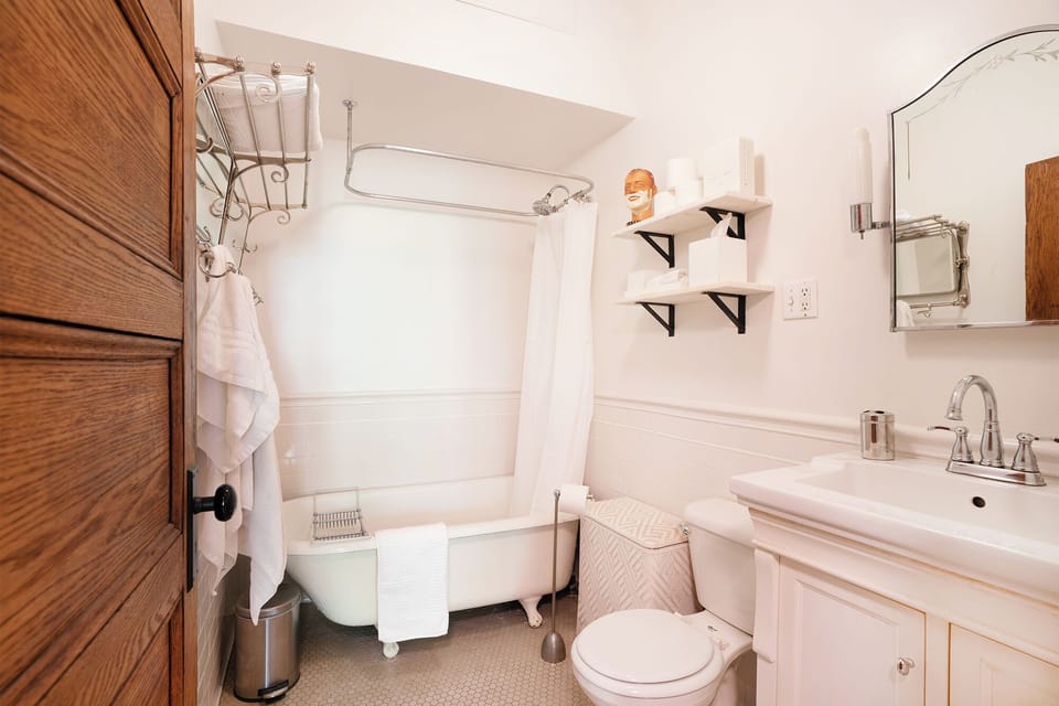 Roomy white bathroom.