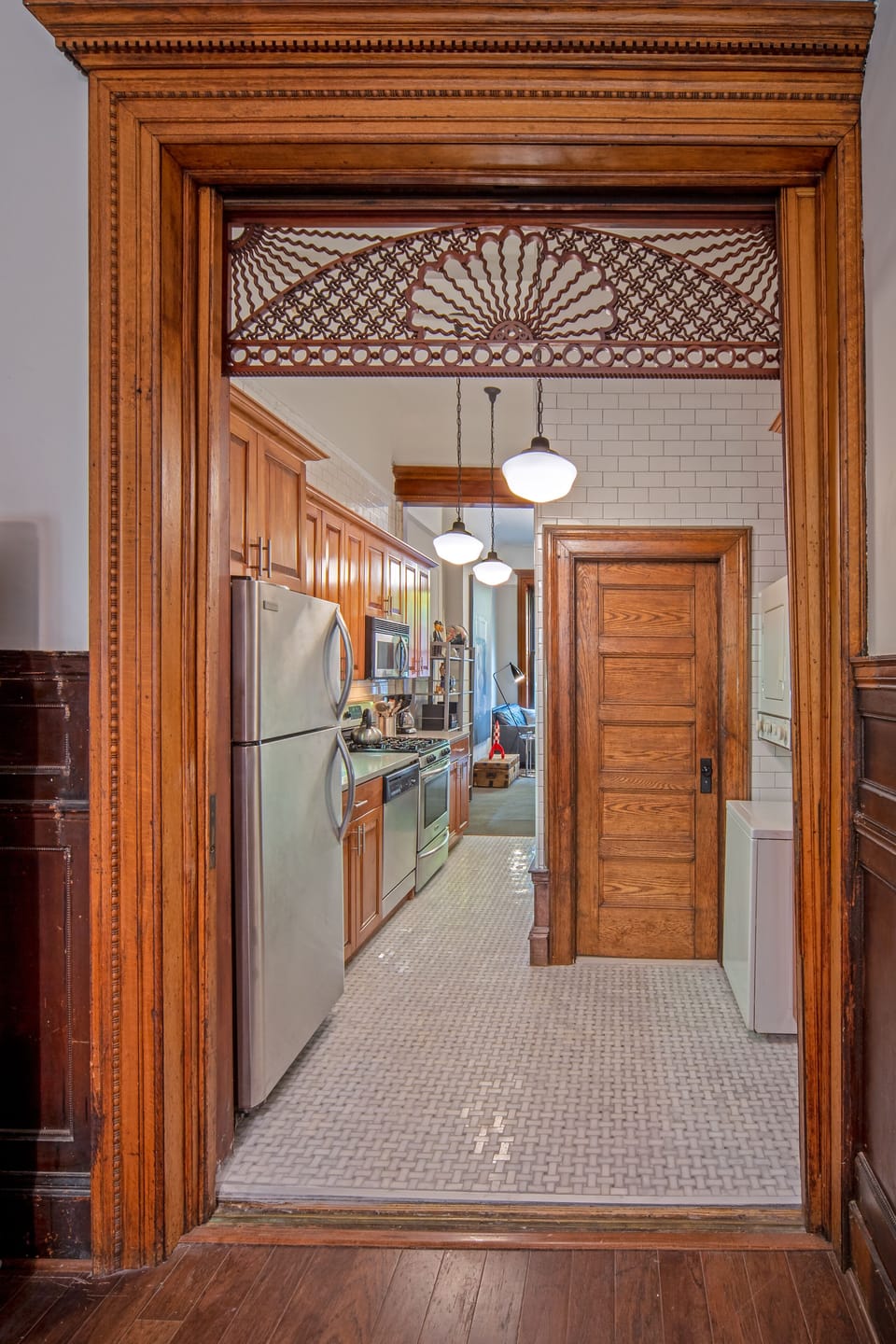 Bathroom door as seen from bedroom.