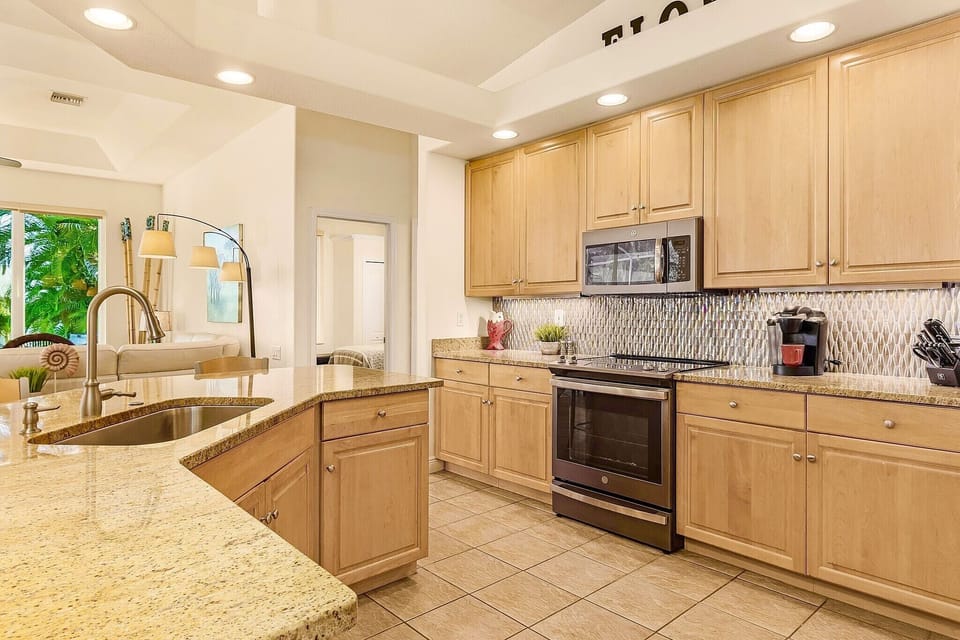 Designer glass tile with beautiful granite counters 
