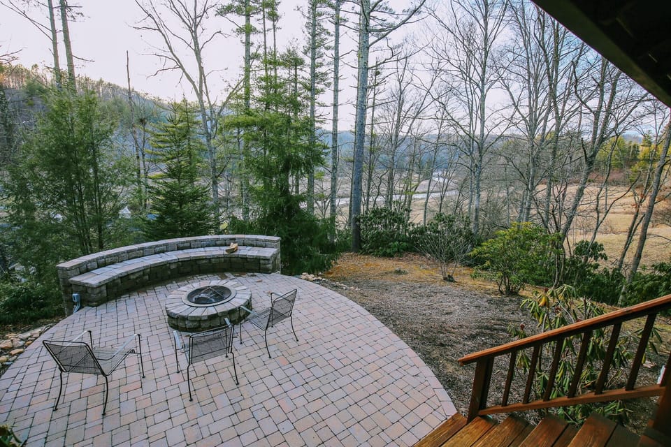 Our fire pit seating area offers you views of the New River below & stars above!