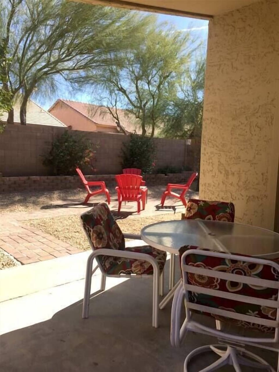 Covered back patio with outside furniture