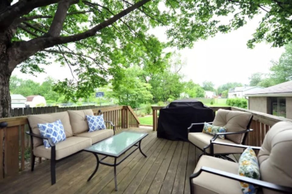 Grill out on our spacious, shaded back deck! Back yard has a large fenced  area