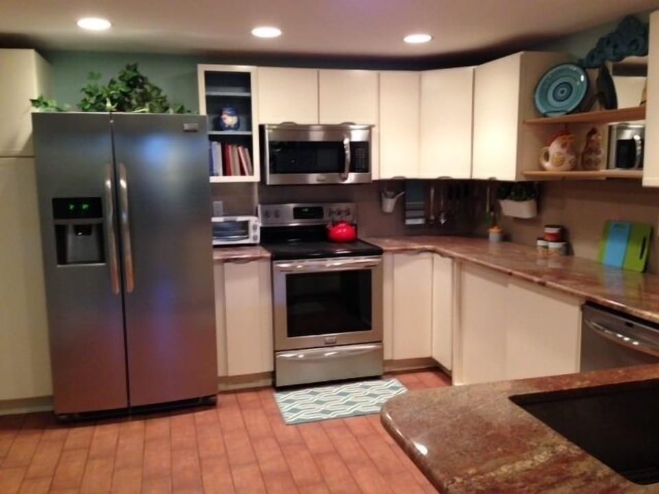 Beautifully equipped kitchen.Lots of granite counter space/stainless appliances.
