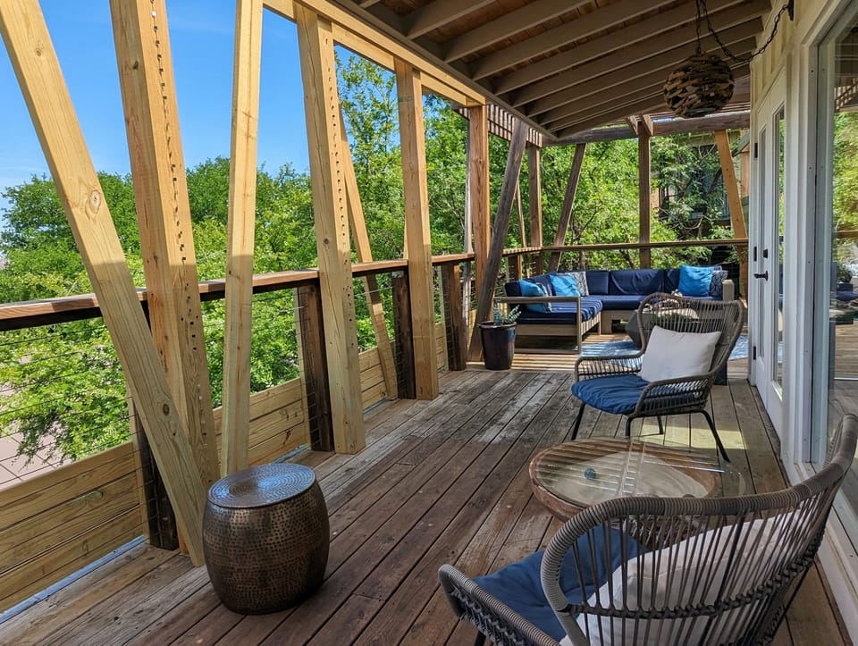 Penthouse & Parkview.  Nature inspired & completely custom. Stone, cedar & glass