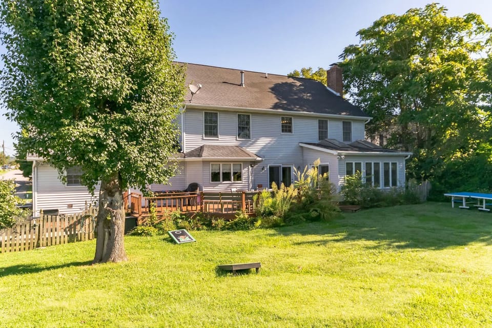 Grill steaks, host an event on the outside wooden patio deck.