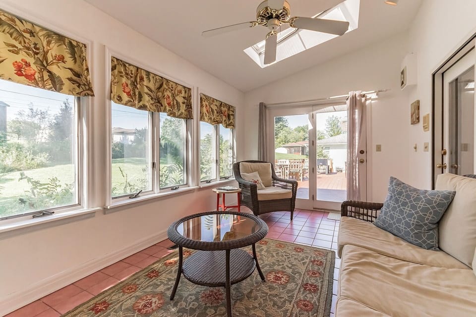 Open the windows, take in the breeze and catch  sun-rays in the sun room.