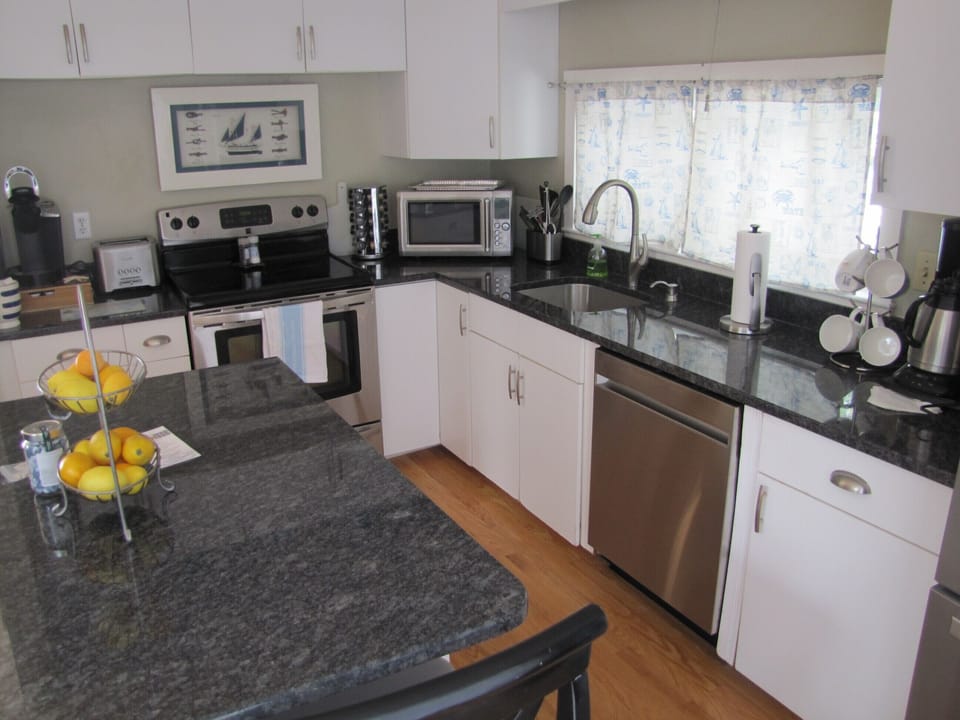 Kitchen with all the comforts of home. A Kuerig and regular coffee maker too!