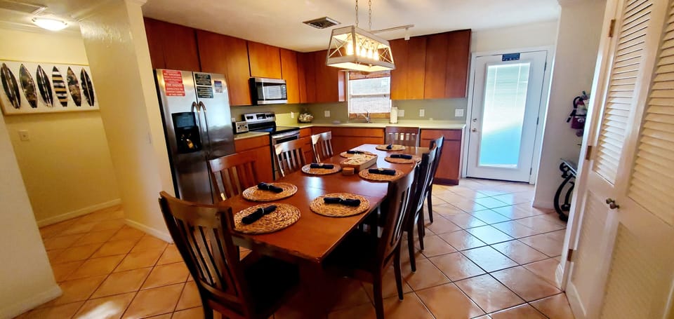 Large fully stocked top floor kitchen and dinning area.