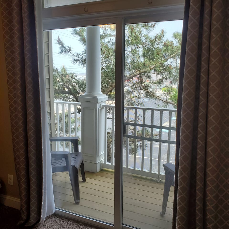 Queen bedroom with balcony
