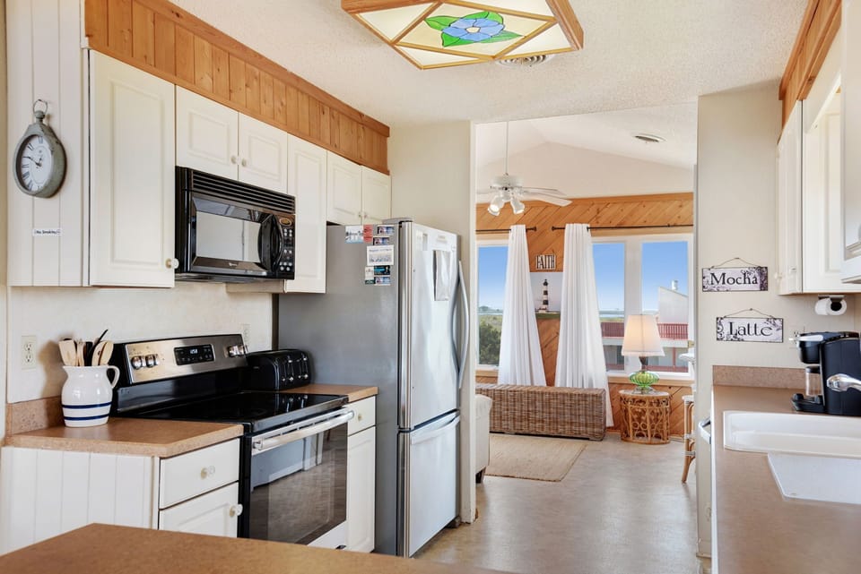 Stainless appliances include Kerurig and Drip Coffee Maker