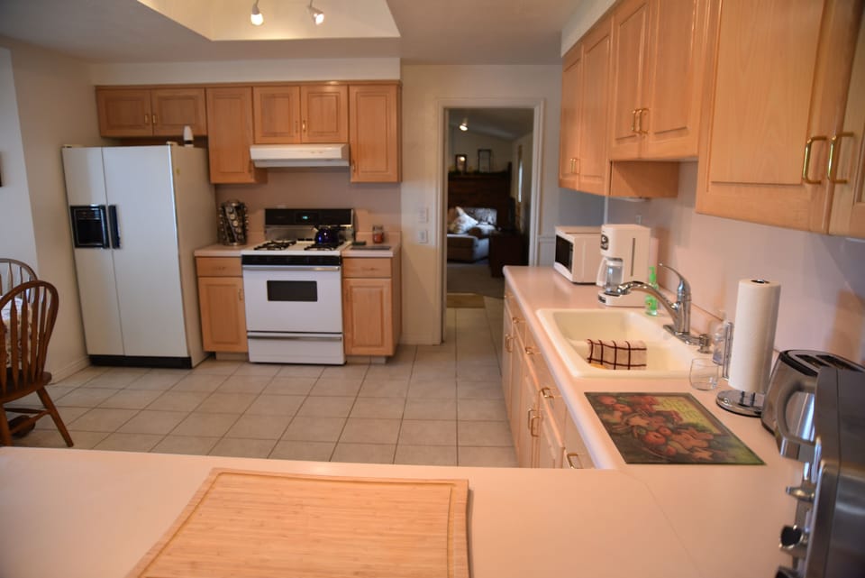 spacious, well stocked  kitchen 