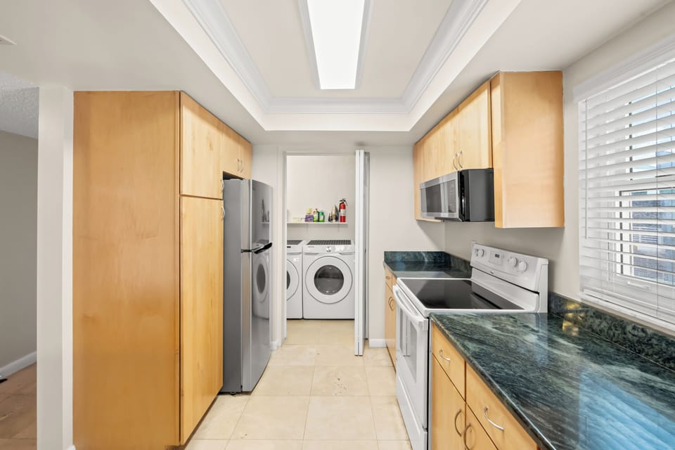 Full size Washer and Dryer directly off the kitchen for your personal use.