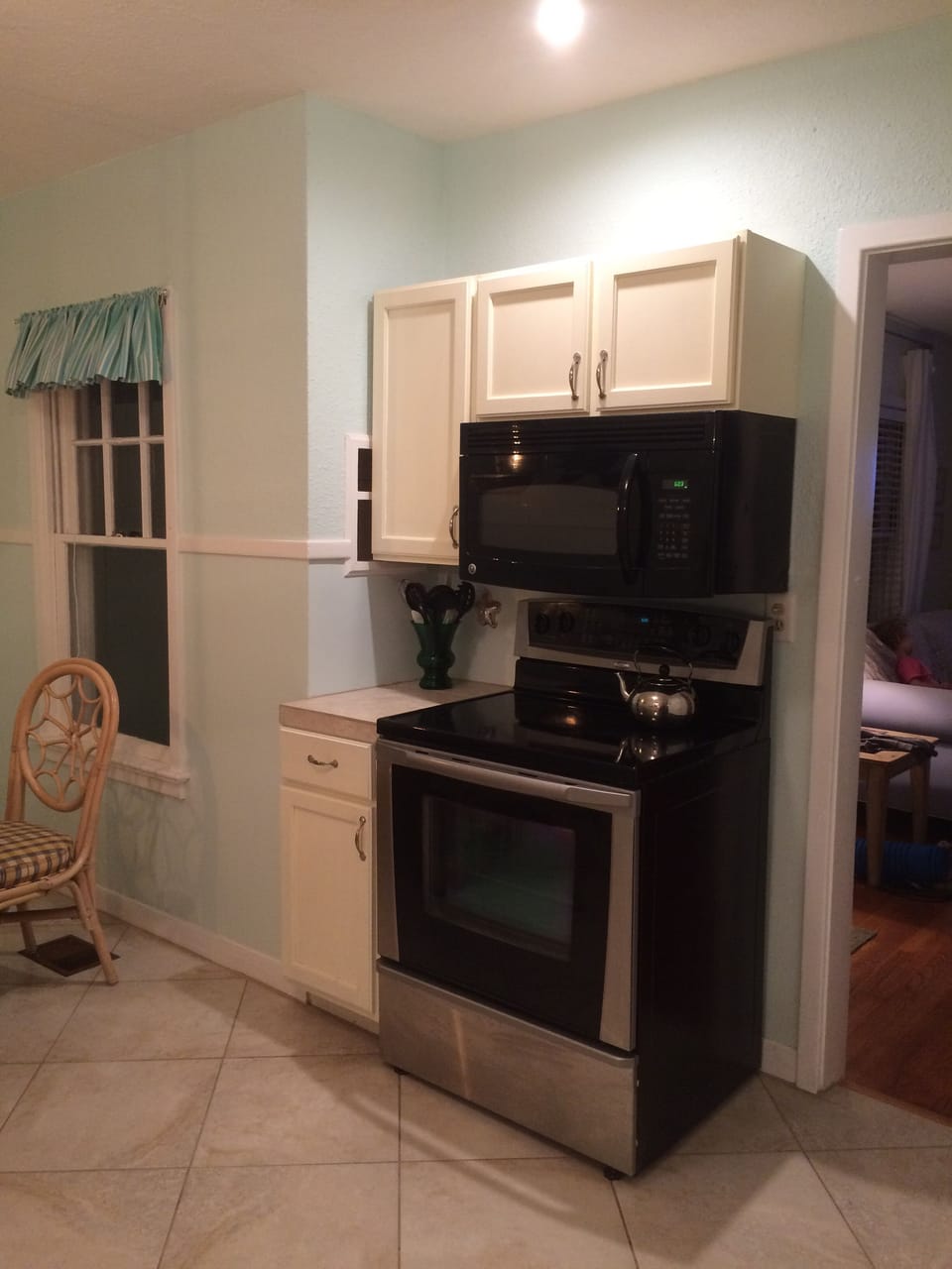 Convection Oven and smooth cooktop with dual burners and warmer.
