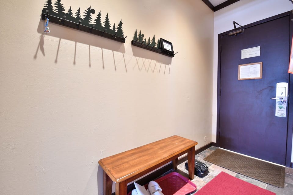 front foyer area with bench to remove ski boots/foot wear