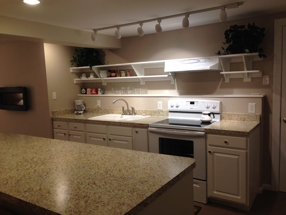 Fully stocked Kitchen. Large counter.