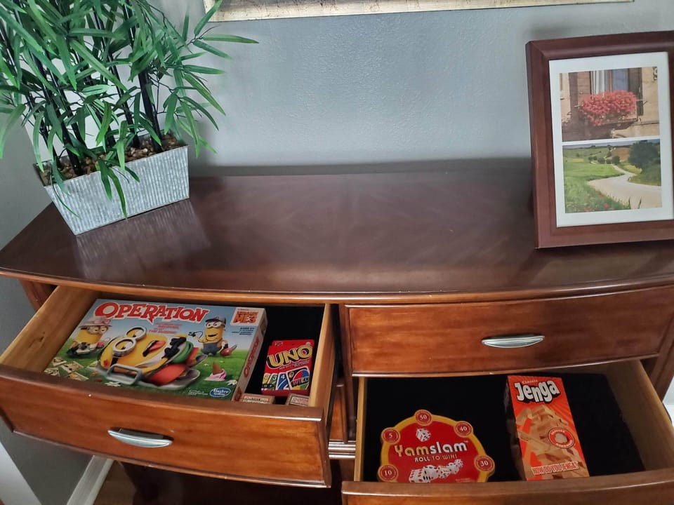 books and board games available in credenza.