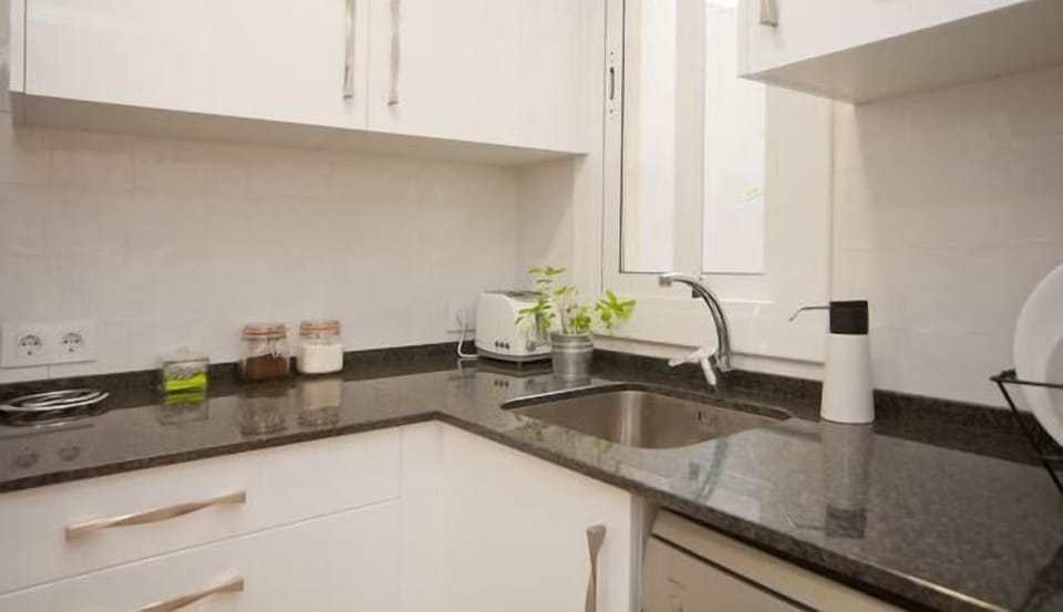 The kitchen is ready for you, with coffee, tea, salt&pepper, sugar, wash.machine