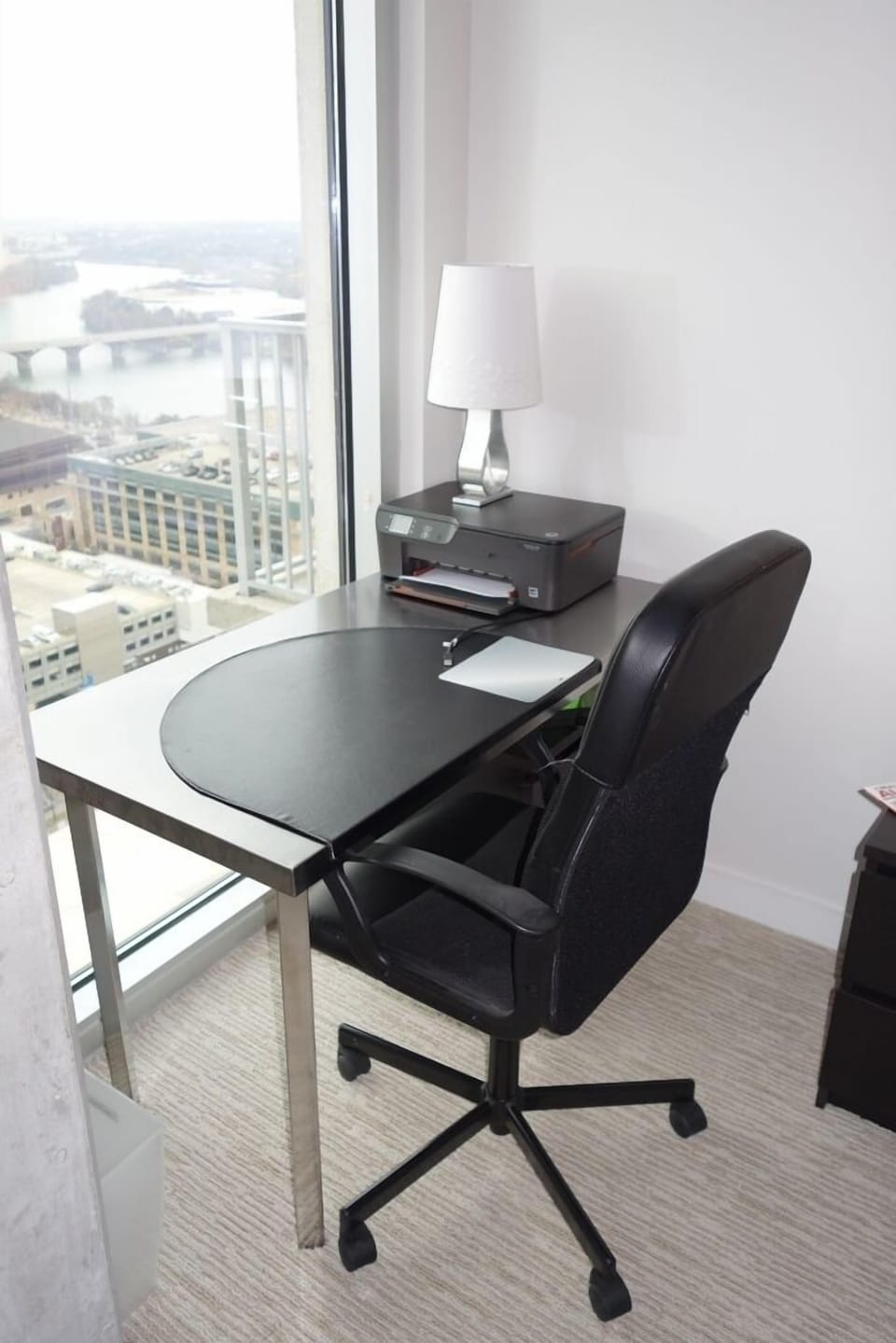 Desks in both bedrooms overlook downtown and the Lake