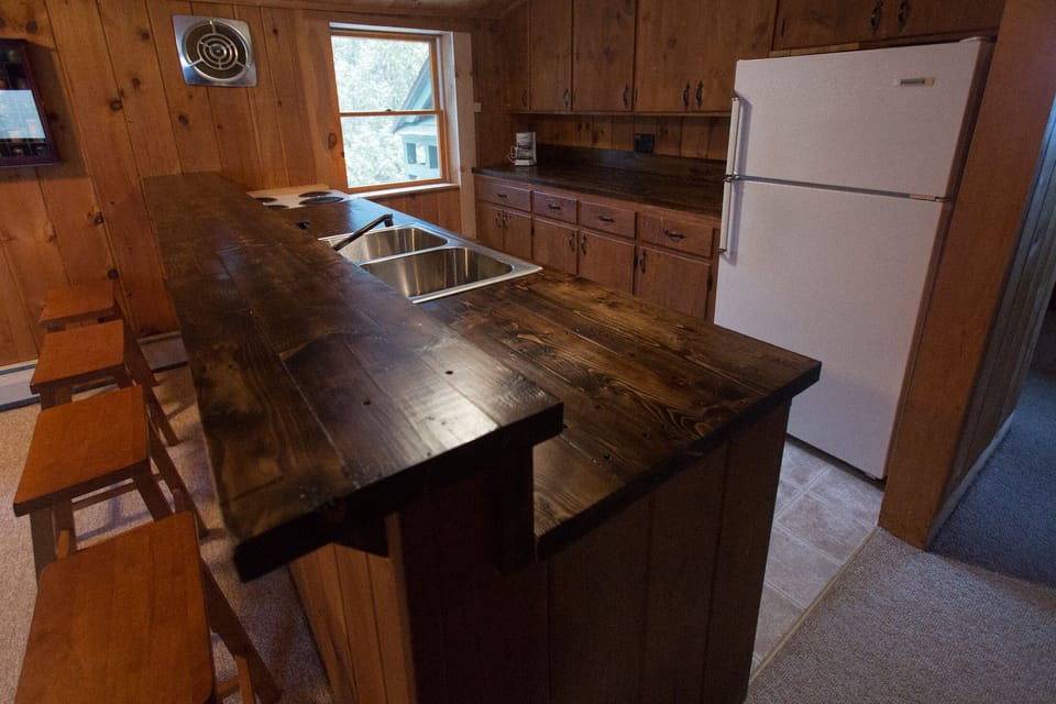 Upstairs Bar area with second kitchen (Kitchen not stocked). 