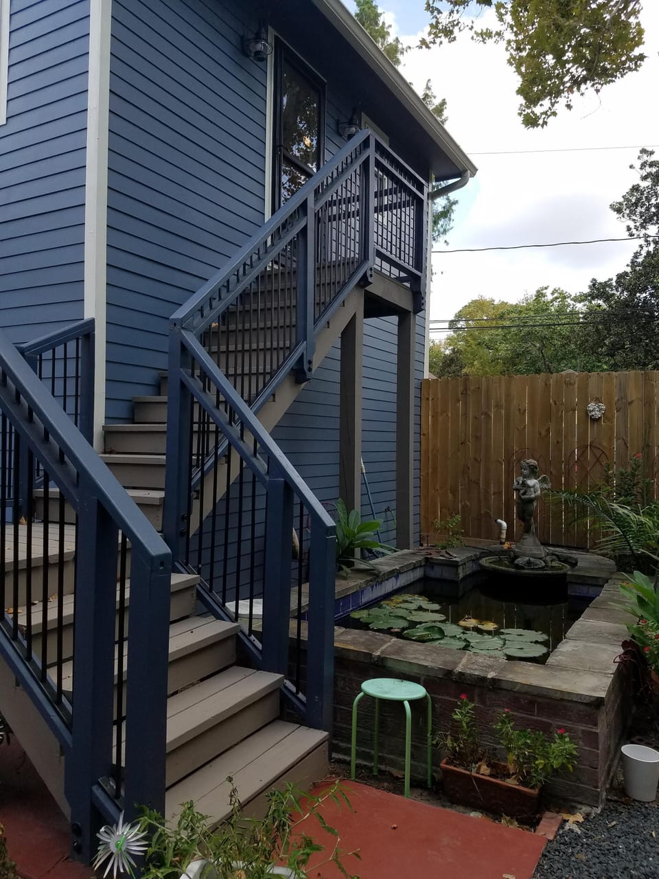 stairs by koi pond