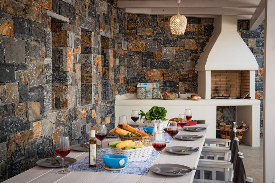 BBQ and dining area at Villa Greece next to the pool and sunterace