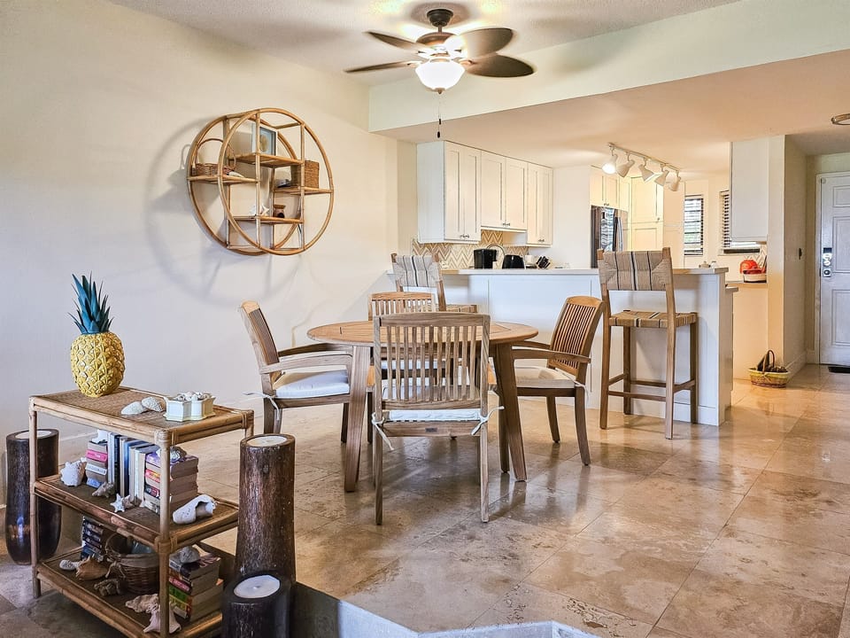 The open floor plan gives ocean views from the kitchen, dining and living room.