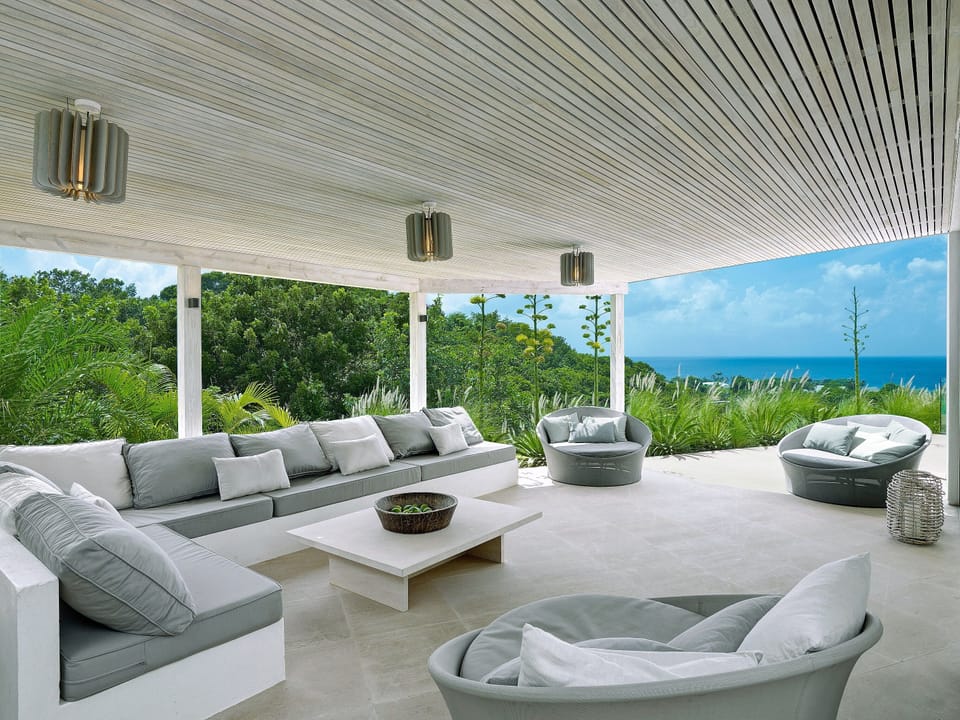 Outdoor seating under shade with views