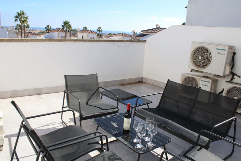 Roof terrace with sea views