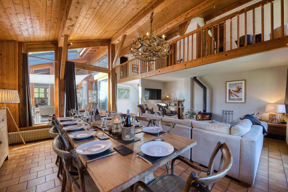 The main room includes a large and very heavy 12-seater oak table