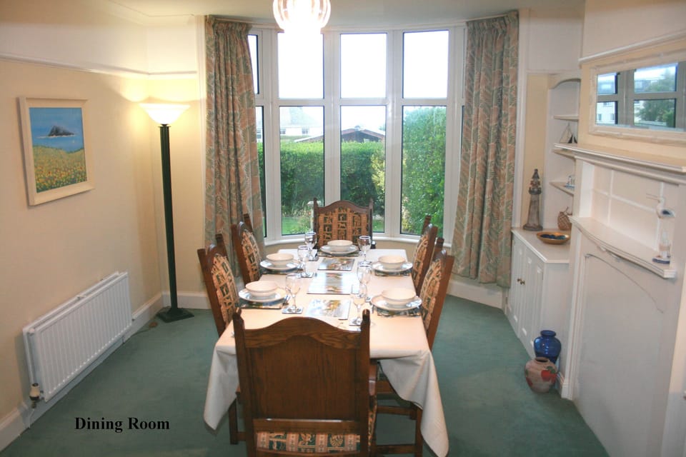 The dining room with views of the back garden
