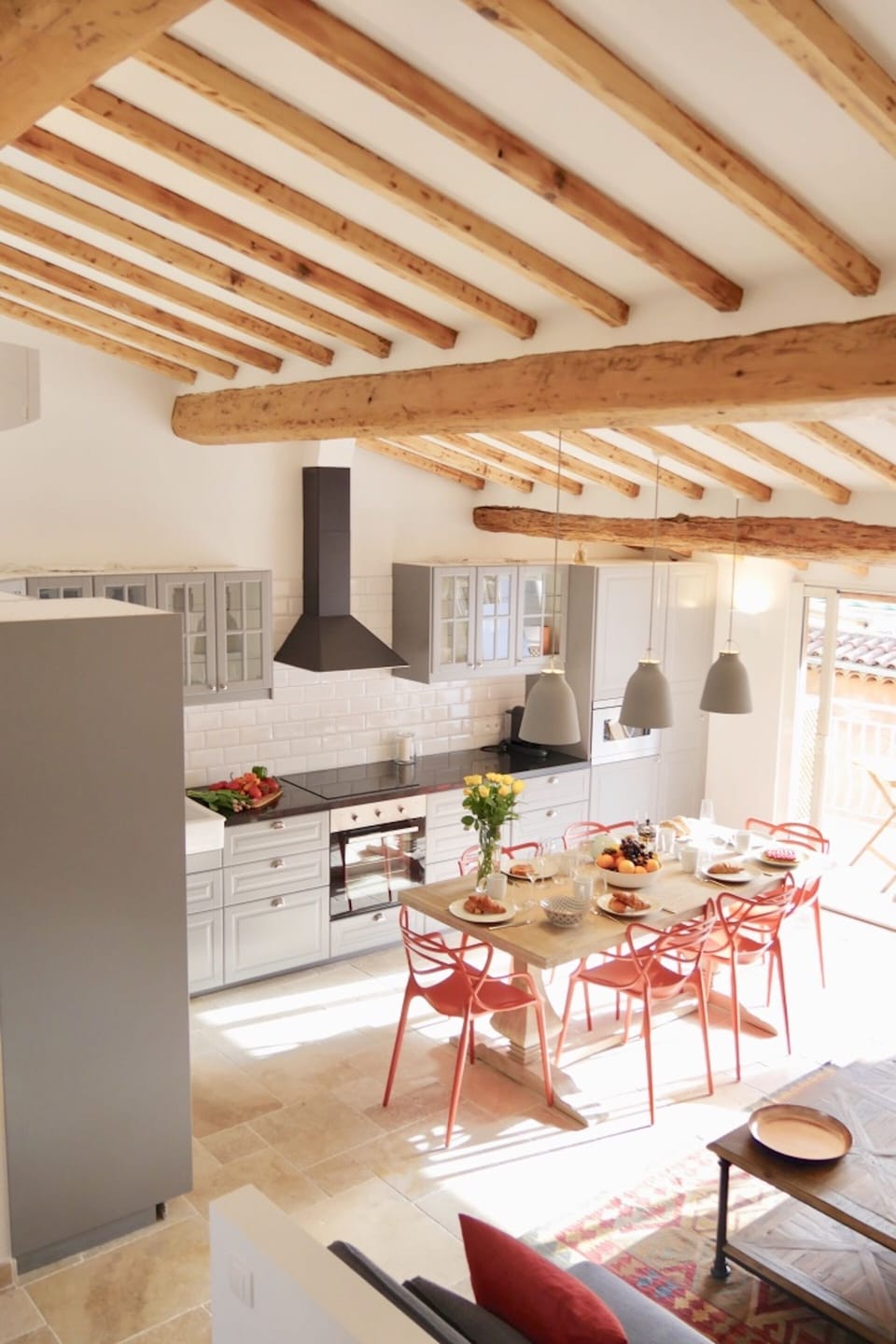 Open plan kitchen and living area, opening direct to large terrace