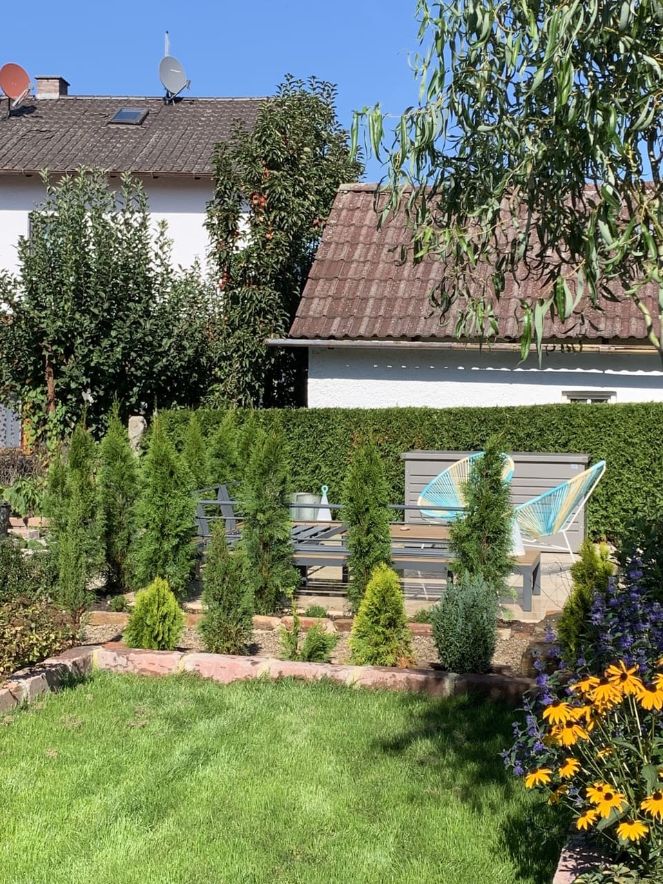 The garden is maturing rapidly, it may look different when you visit.