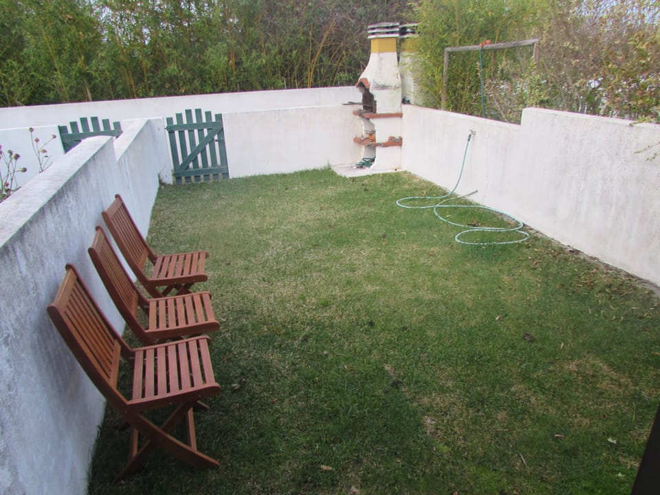 Jardim com churrasqueira privada