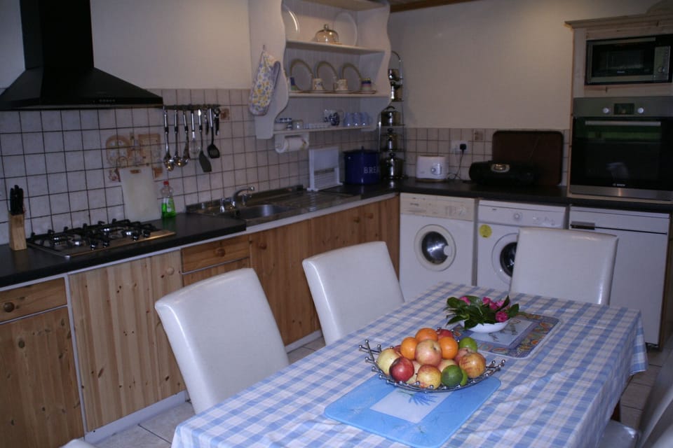 kitchen cum dining with all modern conveniences