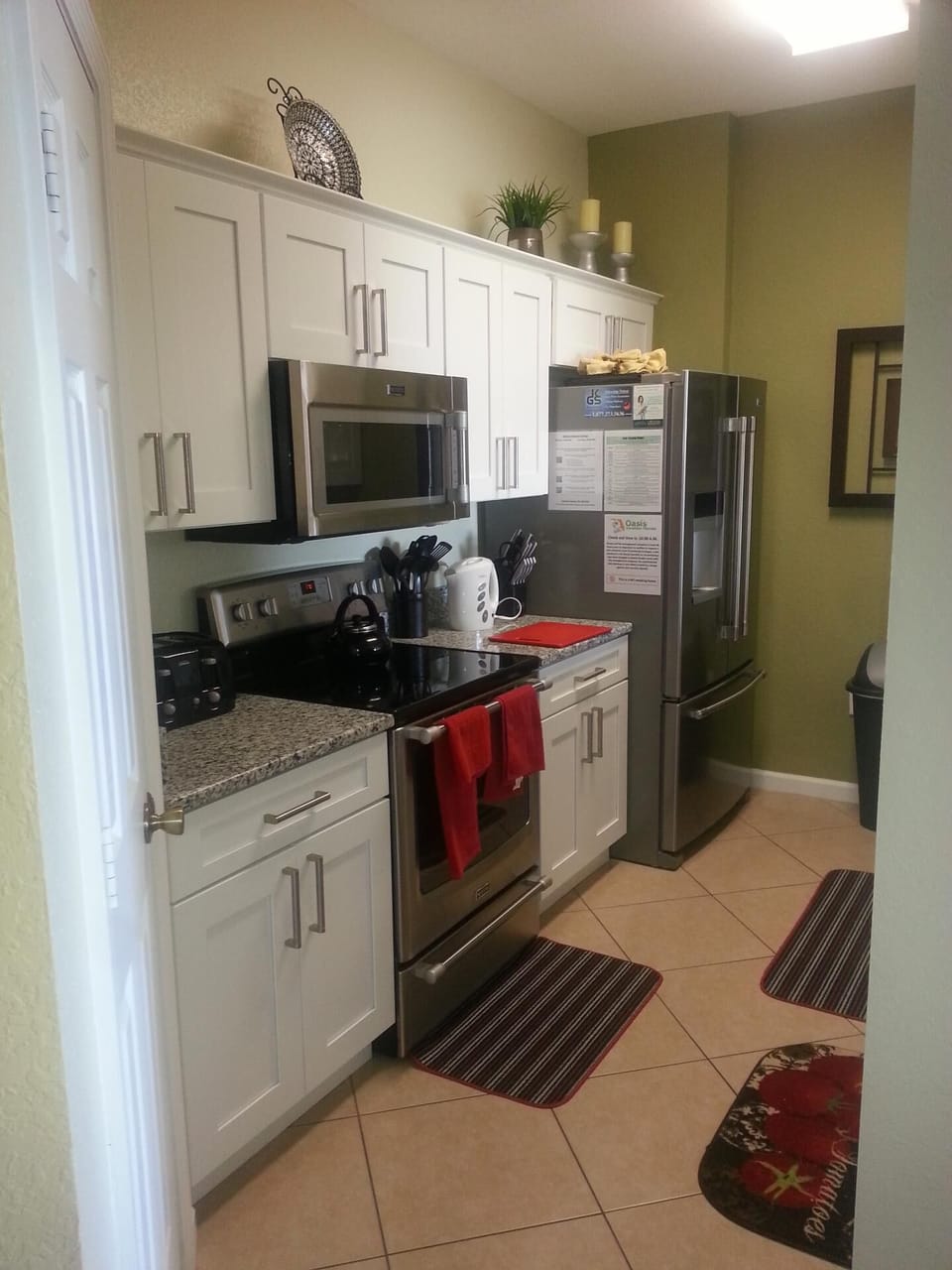 Newly upgraded kitchen cabinets, appliances and granite countertops.