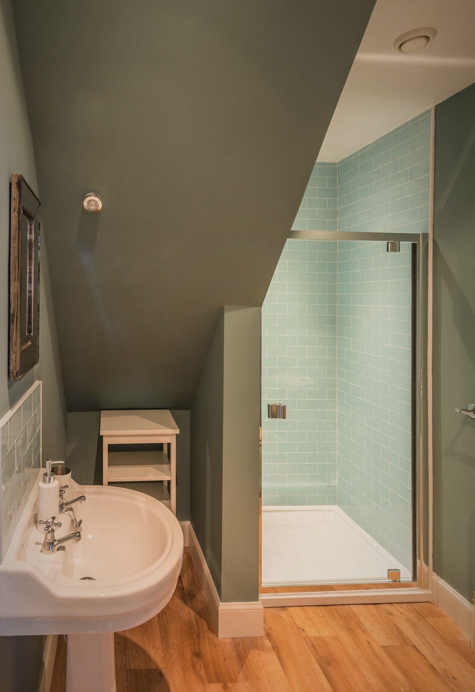 The shower room, next to the third double room.
