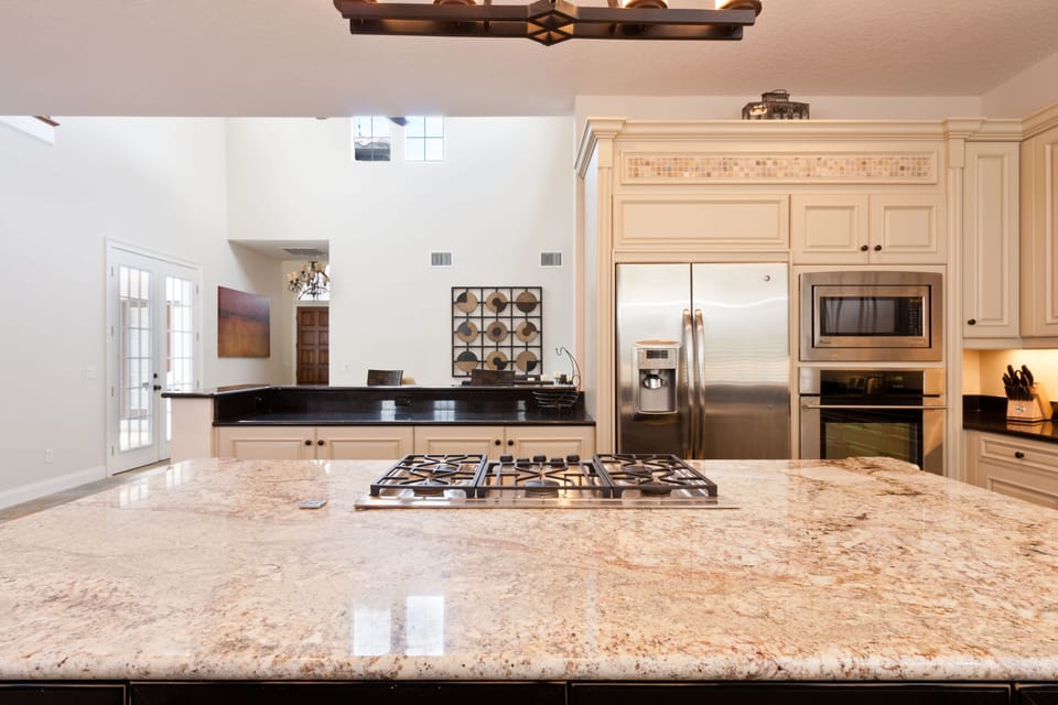 Open plan custom built top end kitchen design